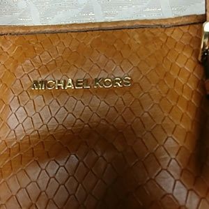 Women tan satchel